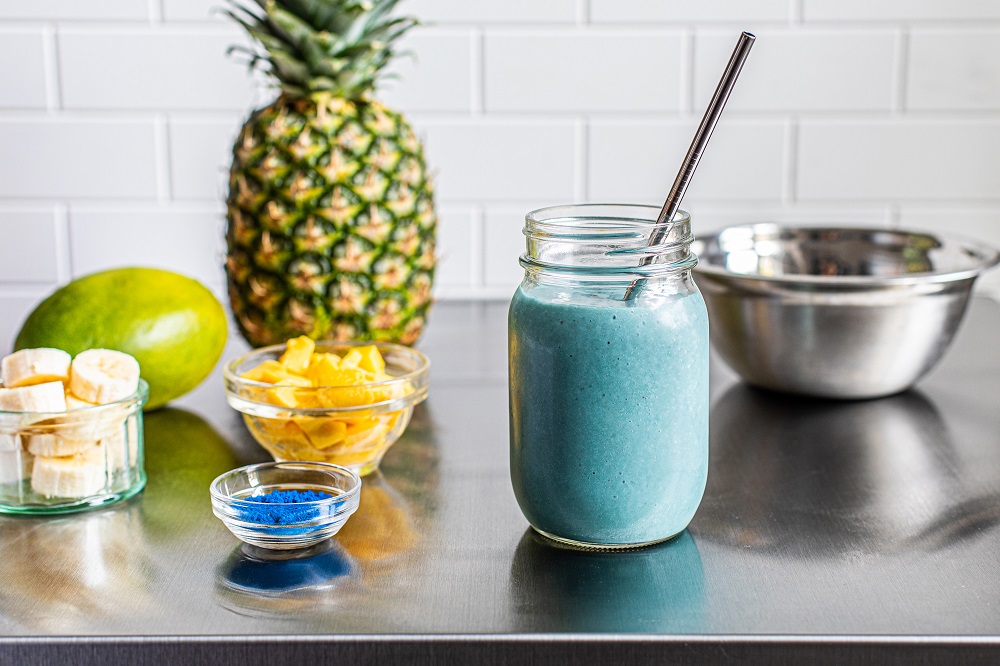 Pineapple-passion fruit and blue spirulina protein smoothie 