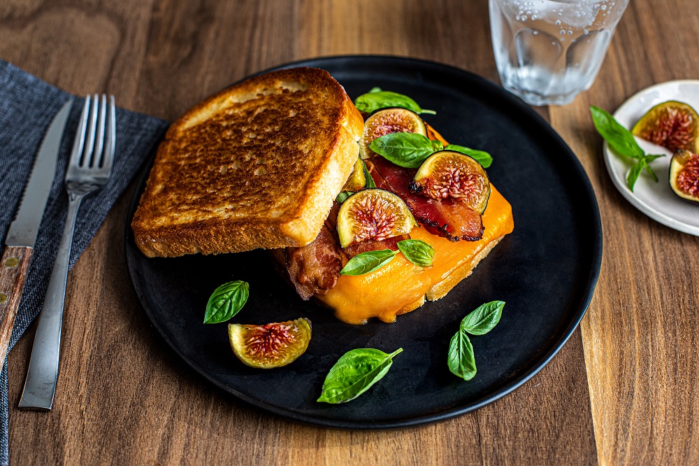Open-faced bacon, fig and basil sandwich